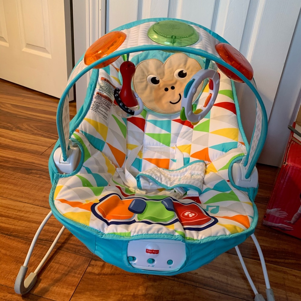 Fisher Price music and lights bouncy seat
